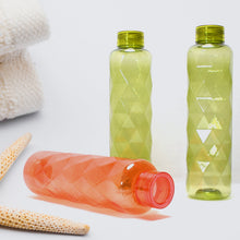 Bottle with a diamond-cut texture, perfect for stylish beverage storage.