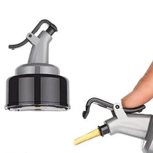 Clear plastic oil dispenser with a controlled use spout and secure lid.
